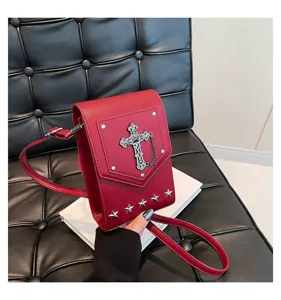Red mini crossbody bag featuring gothic cross and metal stars, trendy chic shoulder bag for women.