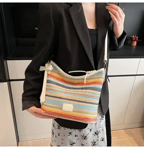 Trendy color-blocking woven bucket bag for women, casual stylish everyday shoulder bag.