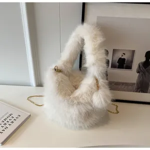 Plush furry shoulder bag with gold chain strap, stylish fluffy handbag for women detail view.