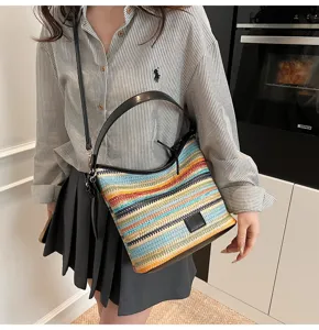 Trendy color-blocking woven shoulder bag for women, casual minimalist hobo bucket bag stylish.