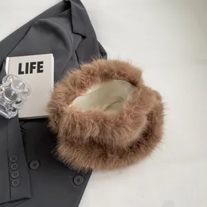 Brown faux fur shoulder bag for women, chic fluffy crossbody bag with chain strap and soft plush.