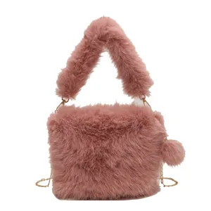Pink fluffy plush handbag for women, cute winter fuzzy crossbody shoulder bag with chain.