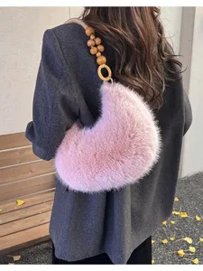 Stylish fluffy crescent shoulder bag for women, cute plush moon handbag with wooden bead handle.