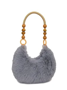 Stylish gray fluffy plush handbag with unique wooden bead handle, perfect winter shoulder bag.