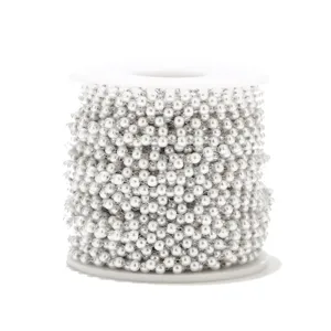 Close-up detail of 3mm white pearl chain spool, perfect for DIY jewelry and crafts design.