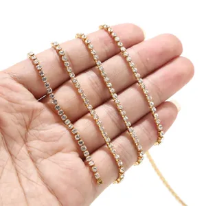 Detail view of golden rhinestone cup chain for DIY jewelry making, 2.5mm claw chain.