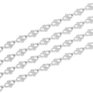 Close-up detail of the intricate embossed hollow metal chain links, showcasing fine craftsmanship.