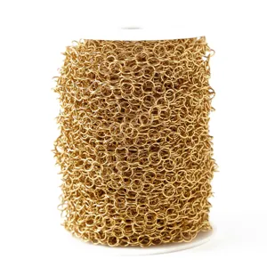 Gold jump ring chain detail view, stainless steel DIY jewelry making accessories spool.