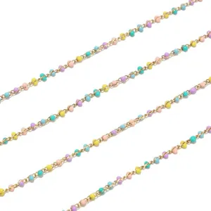 Detailed view of the colorful beaded gold chain, showcasing the 2mm pastel enamel beads.