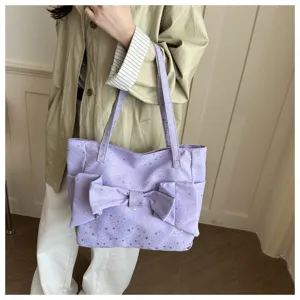Borsa shopper in tela viola chiaro stile coreano con grande fiocco e motivo a stelle.