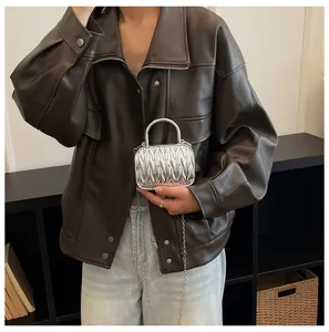 Mini metallic pleated shoulder bag with metal top handle and chain strap for women fashion.