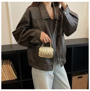 Stylish mini pleated crossbody bag with retro metallic chain, perfect for modern women.