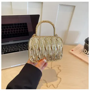 Mini metallic pleated handbag with round handle and chain strap for women fashionable style.