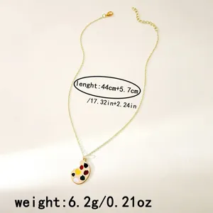 Gold-plated paint palette pendant necklace, artistic style clavicle chain, lightweight design.
