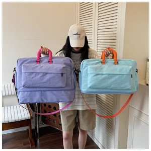 Grand sac de voyage colorblock, idéal pour courts séjours, sport et bagage cabine d'avion.