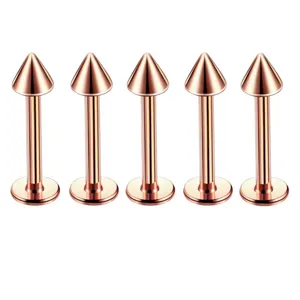 Stainless steel rose gold spike labret stud jewelry detail view, minimalist hip hop piercing style.