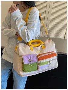Color block travel duffel bag, large capacity canvas shoulder bag, casual commute luggage bag.