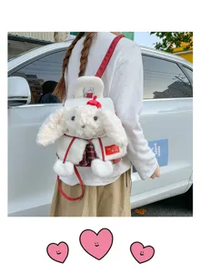 Mignon sac à dos lapin en peluche style ins japonais avec fourrure blanche et béret rouge.
