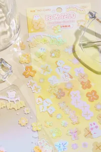 Holographic PVC journaling sticker sheet featuring cute floral and garden designs for DIY crafts.