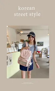Stylish pink and white casual backpack for women, lightweight travel bookbag with transparent pocket.