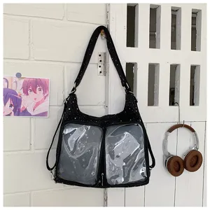 Clear pocket ita bag detail showcasing black star pattern fabric and spacious storage design.