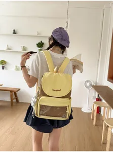 Casual minimalist two-tone backpack with clear front pocket, trendy daily commuting school bag.