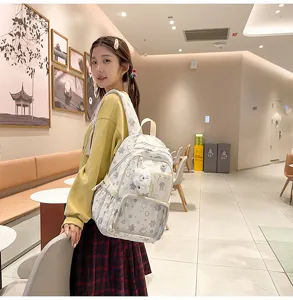 Cute star print school backpack for teen girls, large capacity multi-compartment bookbag.