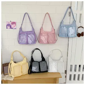 Detailed view of colorful transparent pocket ita bags featuring cute star patterns and display.