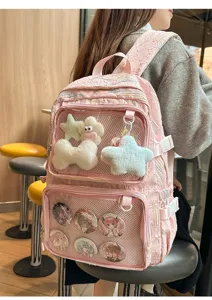 Pink anime ita backpack with transparent front pocket for pins and plush toys detail