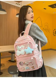 Japanese anime pink ita bag backpack with transparent pocket and cute plush stars charms.