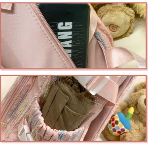 Pink ita backpack detail view, cute student school bag with clear pocket and compartments.