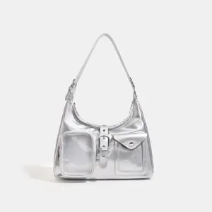 Silver metallic shoulder bag detail, transparent pocket design, stylish daily accessory.