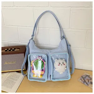 Casual light blue ita bag with transparent front pockets, perfect for daily commute and pins display.