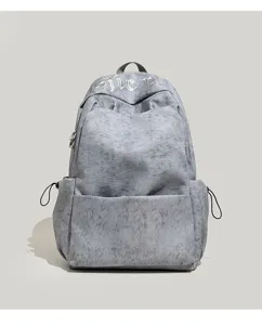 Mochila de lona gris de gran capacidad, estilo casual y elegante bordado gótico superior.