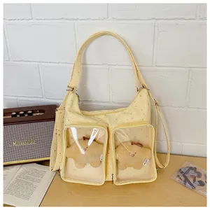 Yellow star print clear front pocket ita bag, casual shoulder crossbody plush doll bag for daily use.