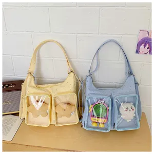 Cute ita bag with transparent front pockets for displaying plush toys and pins daily use.