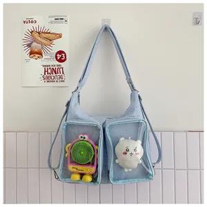 Cute light blue ita bag with clear front pockets, commuter backpack and shoulder bag for dolls.