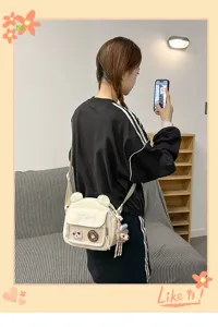 Sac à bandoulière en toile mignon avec oreilles d'ours et poche filet pour style quotidien.