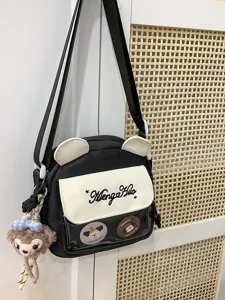 Sac ita en toile japonaise mignon détail avec oreilles d'ours et fenêtre avant transparente.