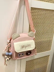 Sac bandoulière ita mignon en toile japonaise avec oreilles d'ours et poche filet.