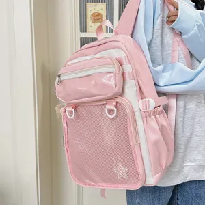 Pink and white ita backpack detail view, large capacity school bag with transparent pocket and mesh.