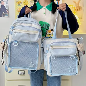 Japanese style cute light blue ita bag set with clear front pocket for pins and dolls, student backpack.