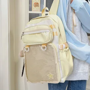 Close-up detail of the Japanese style yellow ita backpack with clear front pocket for pins.
