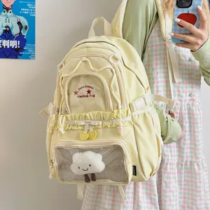 Cute Japanese style large capacity school backpack in light yellow with a transparent front pocket.