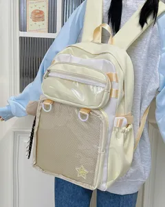 Detailed view of large capacity cute Japanese style ita backpack with transparent mesh pockets.