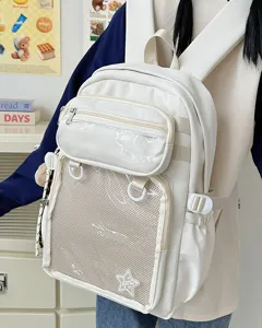 White ita backpack large capacity school bag featuring clear mesh front pocket detail view.