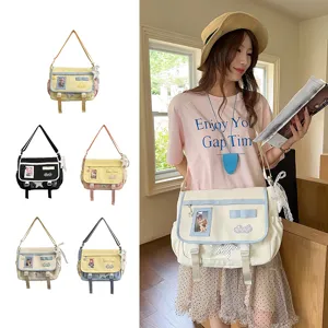 Japanese ins style canvas messenger bag with cute transparent pocket and large capacity for students.