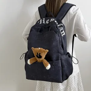 Mochila coreana ligera de gran capacidad con colgante de oso para estudiantes viaje.