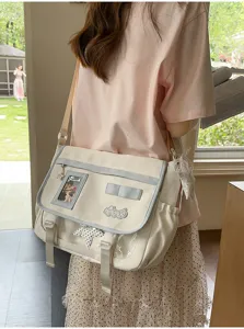 Japanese style canvas messenger bag detail, large capacity student crossbody casual bag.