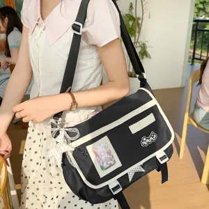 Japanese ins style canvas messenger bag for women, large capacity cross-body school bag.